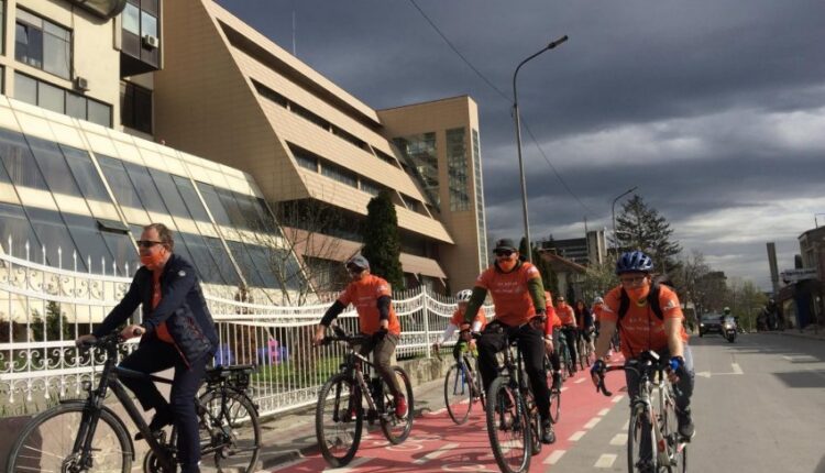 Dozens of cyclists march in honor of the Dutch National